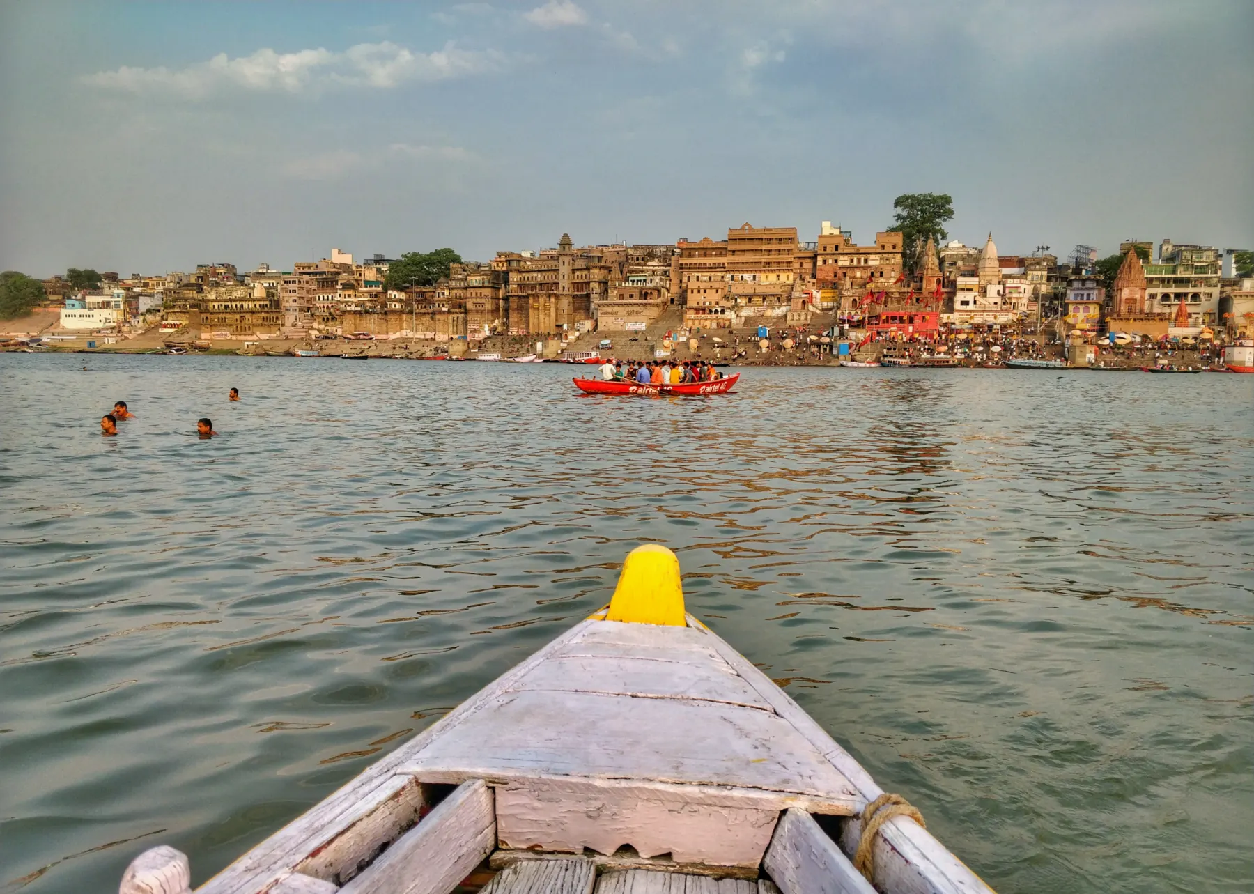 The Varanasi riverfront seen from the bow of a boat